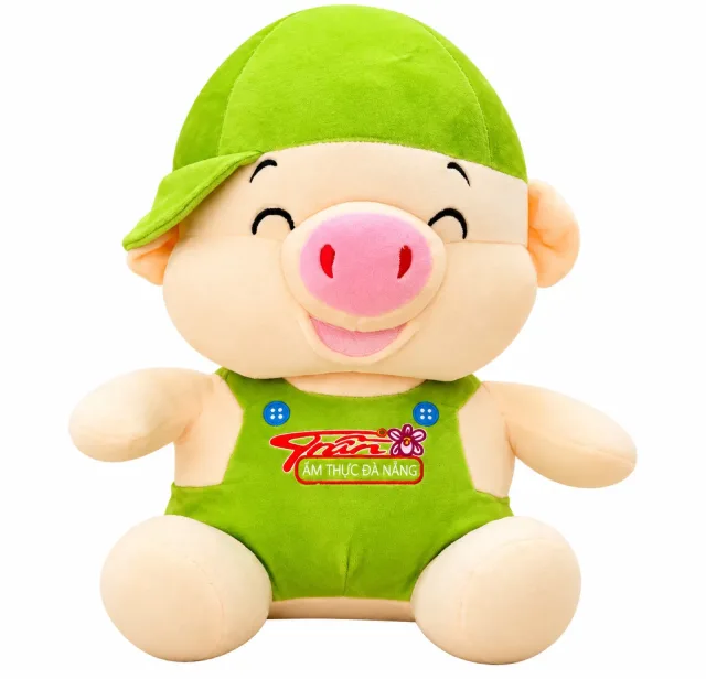 Heo bông đội mũ xanh mặc yếm xanh lá