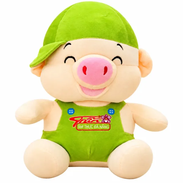Heo bông đội mũ xanh mặc yếm xanh lá